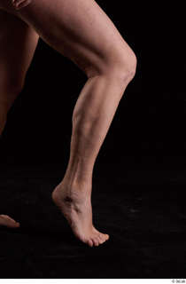 Carly  1 calf flexing nude side view 0007.jpg